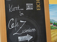 images/Galerie/Cafe-Zuckerkuss_Schild.jpg